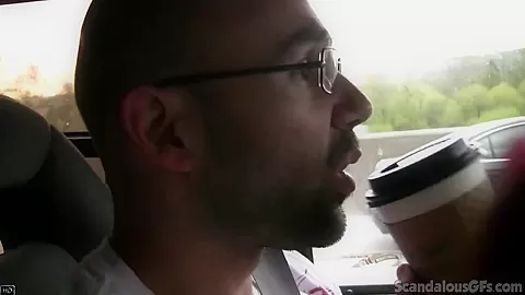 Hot Babe rubbing a cock while the guy driving caught on tape