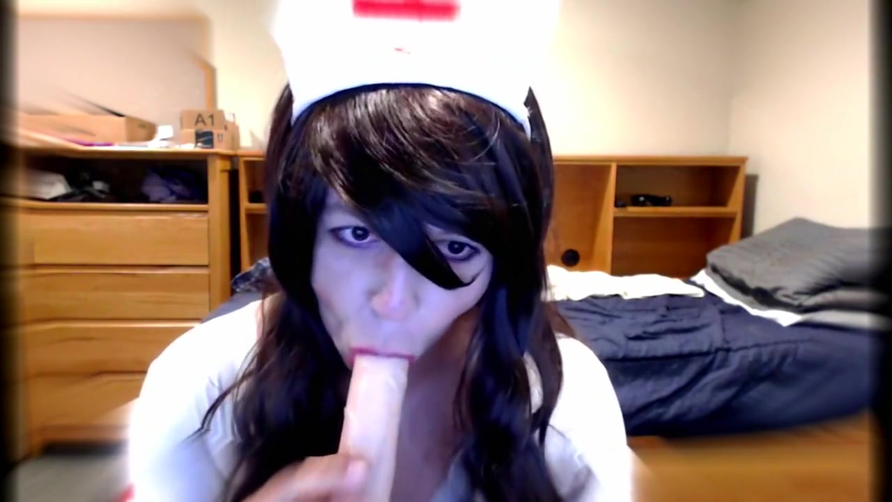 Cute Crossdresser Nurse Blows Dildo