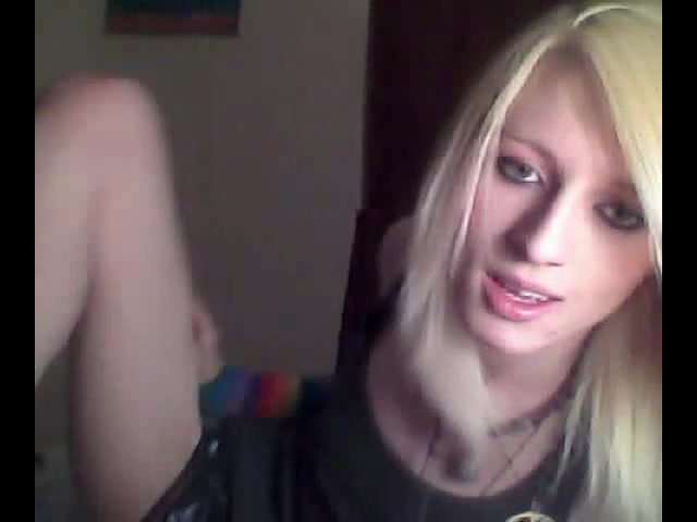 Platinum blonde emo tgirl does a bit of softcore posing