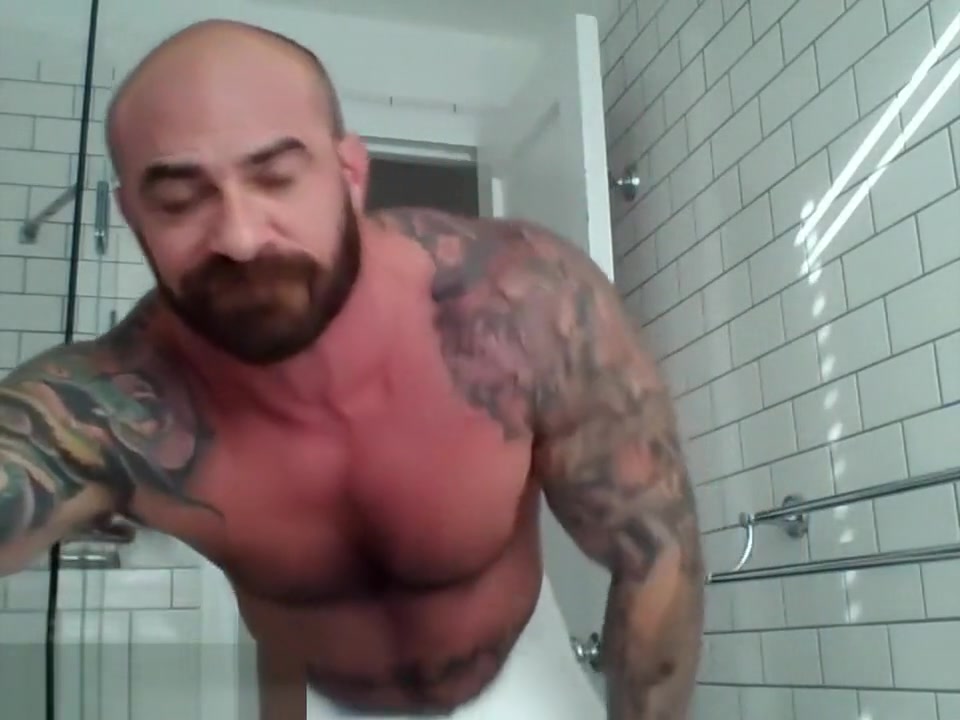 Tattooed muscle stud showers