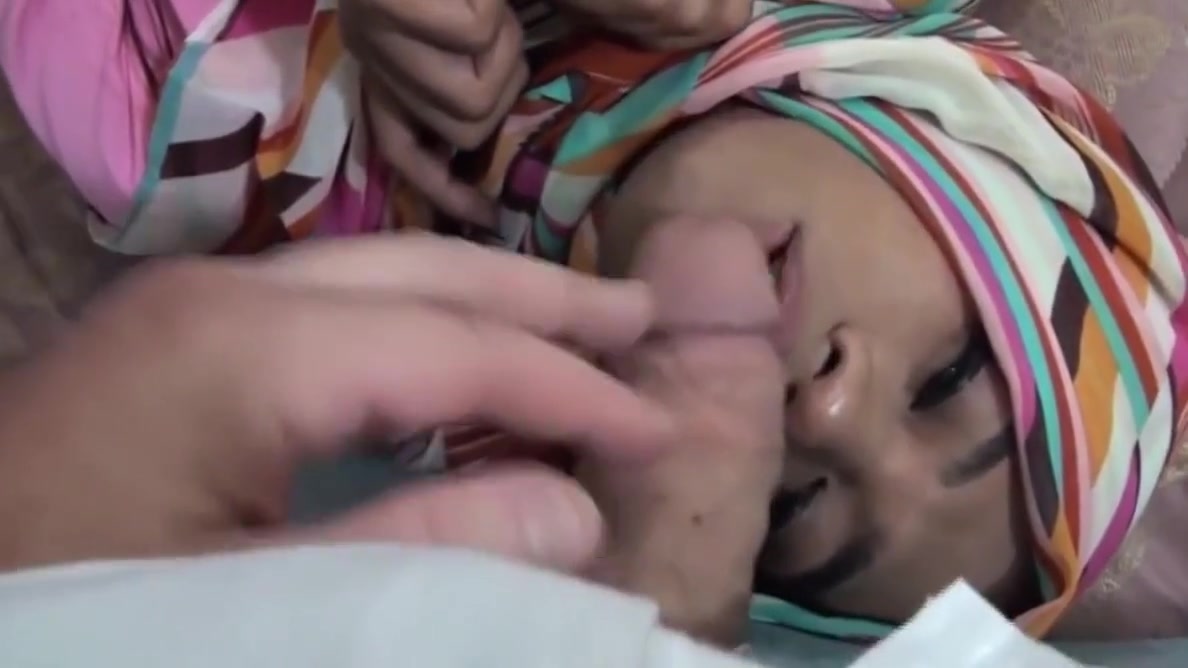 TS ladyboy in hijab tied up, cums while sucking white cock