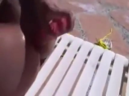 Busty tranny enjoys outdoor masturbation